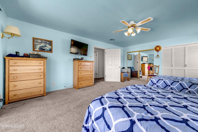 2855 Wilcox Ranch Rd, Reno, NV 89510 - carpeted bedroom featuring two closets and a ceiling fan