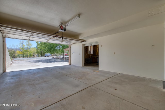 2855 Wilcox Ranch Rd, Reno, NV 89510 - garage featuring a garage door opener