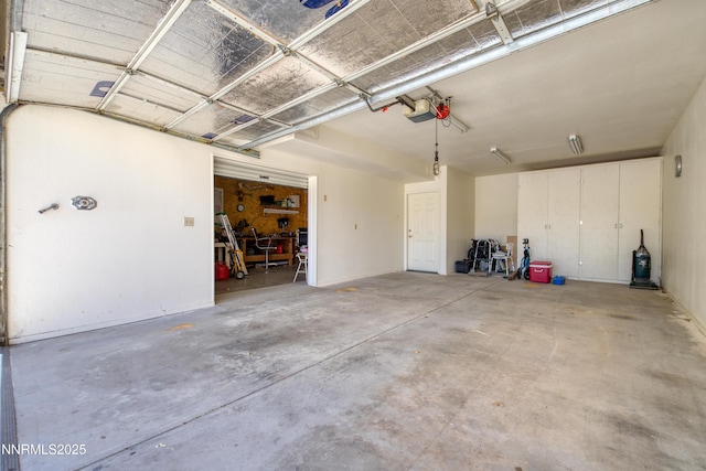 2855 Wilcox Ranch Rd, Reno, NV 89510 - garage featuring a garage door opener
