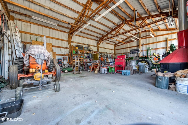 2855 Wilcox Ranch Rd, Reno, NV 89510 - garage with metal wall and a workshop area