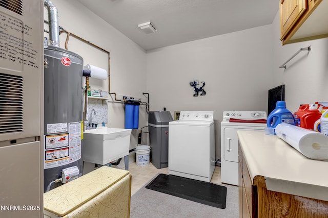 2855 Wilcox Ranch Rd, Reno, NV 89510 - laundry area featuring cabinet space, water heater, washer and clothes dryer, and heating unit