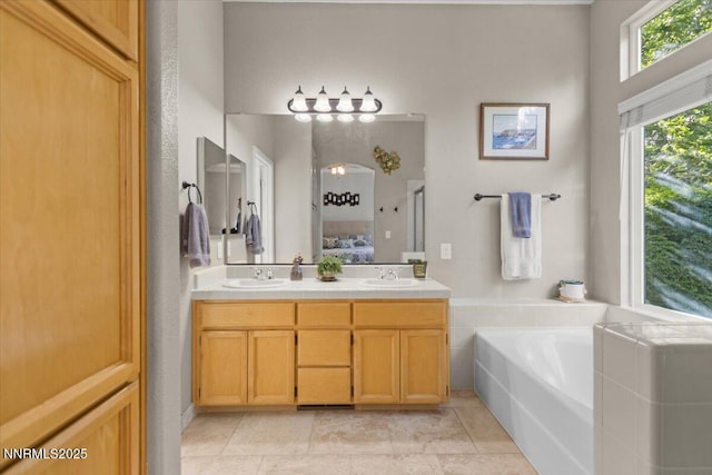 3215 Epic Ave, Reno, NV 89512 - full bathroom with a bath, double vanity, and a shower with door