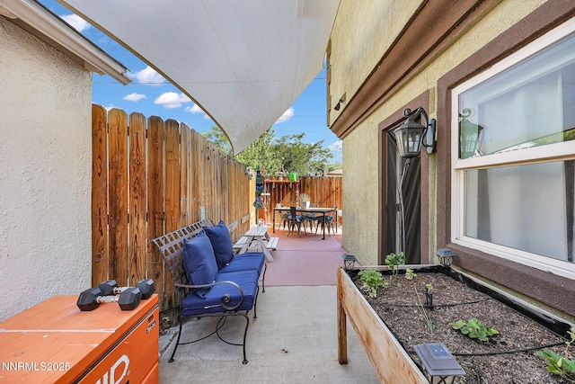 1236 Victorian Plaza Cir, Sparks, NV 89431 - fenced backyard featuring outdoor dining area, a patio, and a vegetable garden
