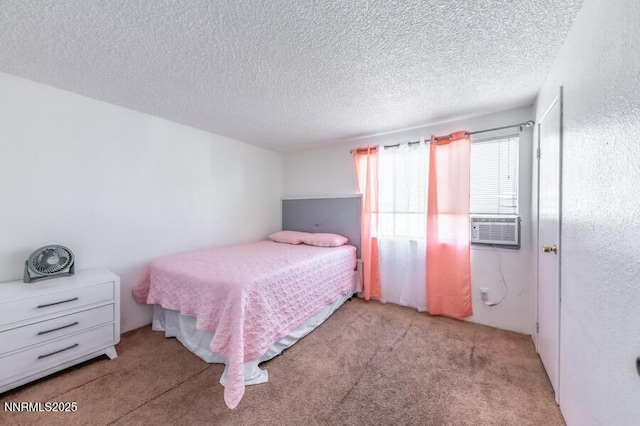 1412 E 9th St Unit 7, Reno, NV 89512 - carpeted bedroom featuring a textured ceiling and cooling unit