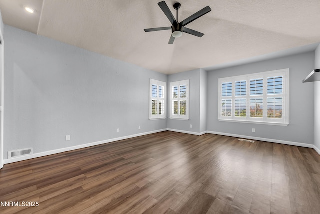 979 University Ridge Dr, Reno, NV 89512 - unfurnished room with a ceiling fan, dark wood-style flooring, and a textured ceiling