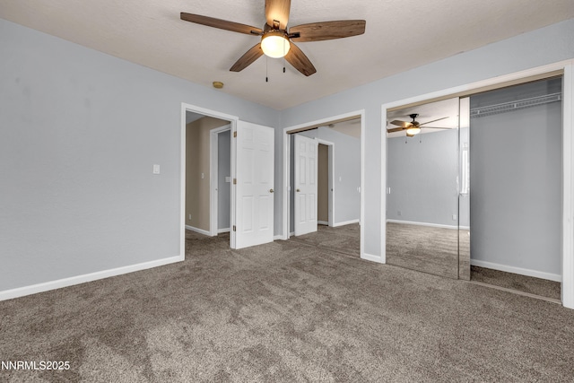 979 University Ridge Dr, Reno, NV 89512 - unfurnished bedroom with two closets, carpet flooring, and ceiling fan