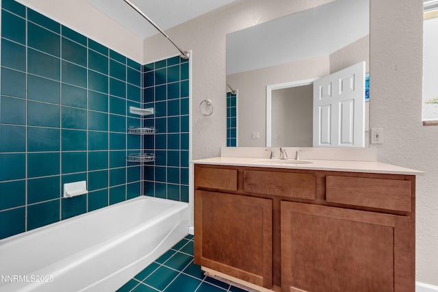 979 University Ridge Dr, Reno, NV 89512 - full bathroom with a textured wall, vanity, shower / bathtub combination, and tile patterned floors