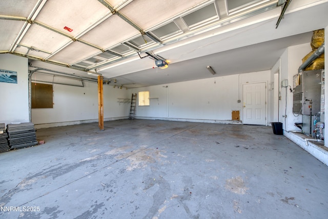 979 University Ridge Dr, Reno, NV 89512 - garage with a garage door opener and heating unit