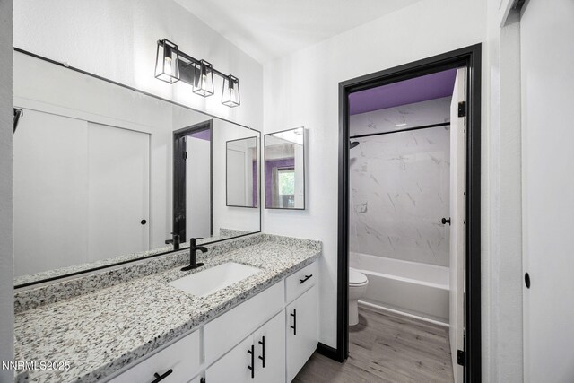 2450 Lymbery St Unit 233, Reno, NV 89509 - full bath with vanity, wood finished floors, and shower / bathtub combination