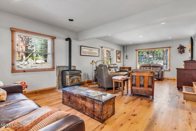 458 Center St, Zephyr Cove, NV 89448 - living room with a wood stove, light wood-style floors, and recessed lighting
