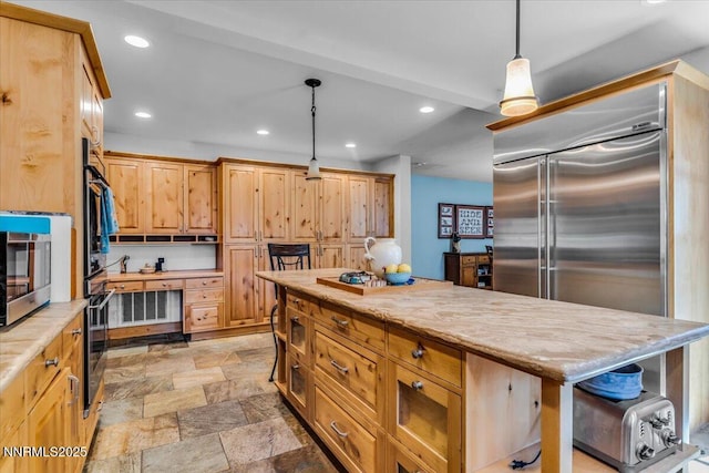 458 Center St, Zephyr Cove, NV 89448 - kitchen featuring a center island, hanging light fixtures, recessed lighting, and light stone counters