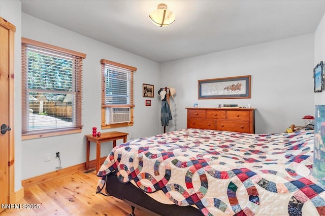 458 Center St, Zephyr Cove, NV 89448 - bedroom featuring light wood-type flooring and cooling unit