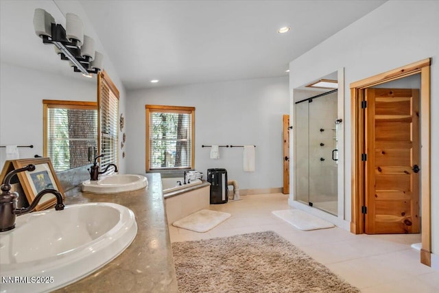 458 Center St, Zephyr Cove, NV 89448 - full bath featuring a stall shower, a garden tub, recessed lighting, tile patterned floors, and double vanity
