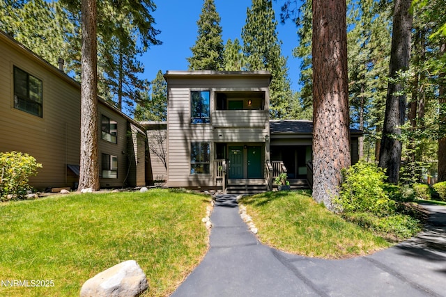 136 Juanita Dr Unit 47, Incline Village, NV 89451 - view of front of house featuring covered porch and a front yard