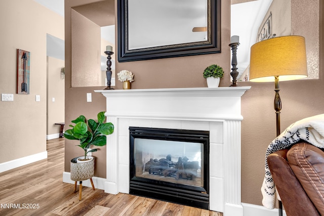 1450 Talon Ct, Spanish Springs, NV 89441 - detailed view of wood finished floors and a fireplace