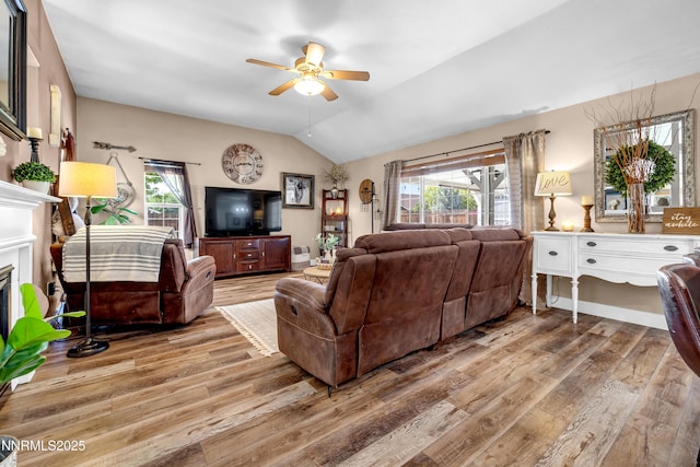 1450 Talon Ct, Spanish Springs, NV 89441 - living area featuring ceiling fan, wood finished floors, lofted ceiling, and plenty of natural light