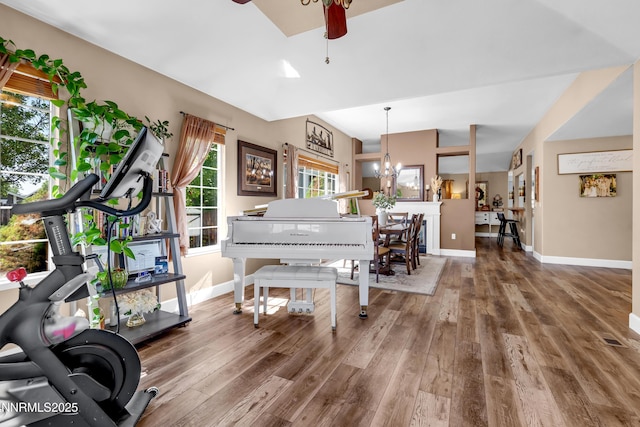 1450 Talon Ct, Spanish Springs, NV 89441 - living area with wood finished floors, ceiling fan, and a chandelier