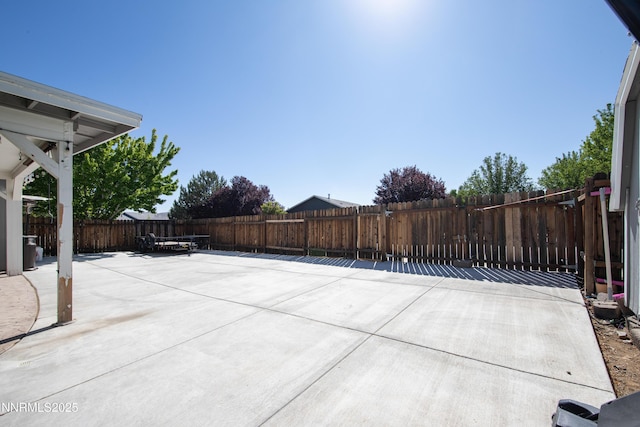 1450 Talon Ct, Spanish Springs, NV 89441 - fenced backyard with a patio area