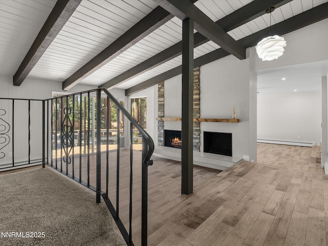 189 Ray Way, Zephyr Cove, NV 89448 - staircase with a fireplace, a baseboard heating unit, and wood finished floors
