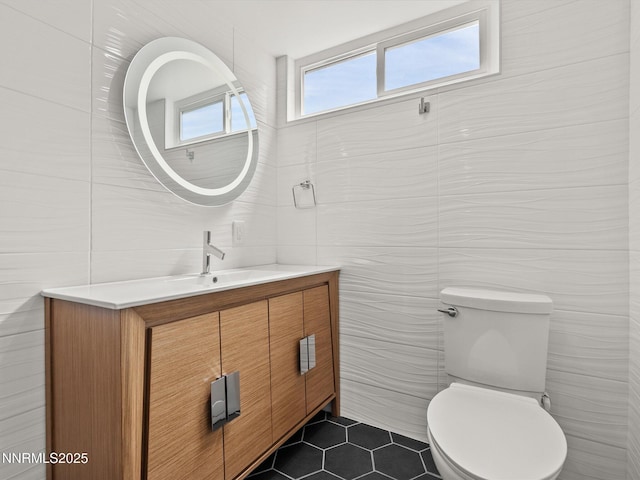 189 Ray Way, Zephyr Cove, NV 89448 - half bath featuring tile walls, vanity, and tile patterned floors