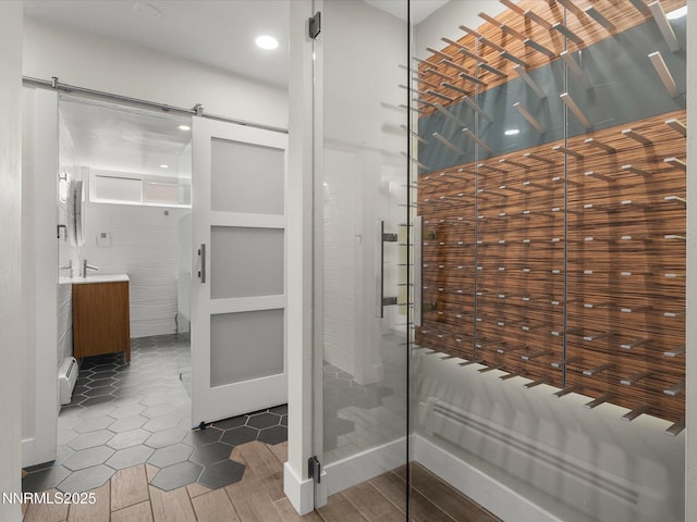 189 Ray Way, Zephyr Cove, NV 89448 - bathroom with vanity, a baseboard heating unit, tile patterned flooring, and recessed lighting