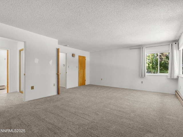 189 Ray Way, Zephyr Cove, NV 89448 - empty room with carpet, a textured ceiling, and a baseboard heating unit