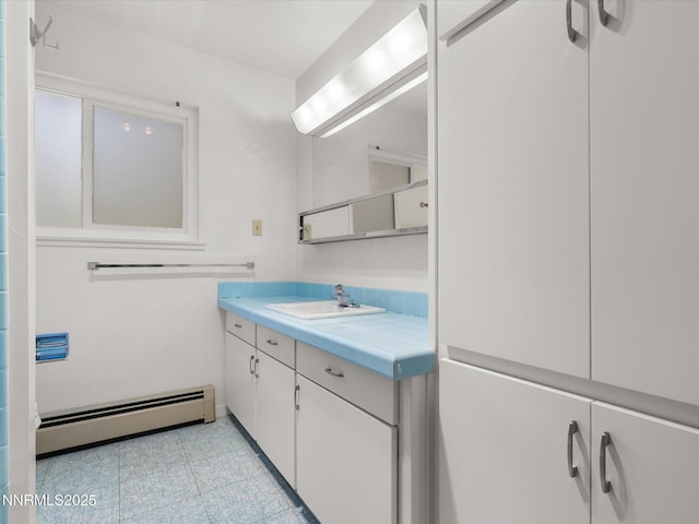 189 Ray Way, Zephyr Cove, NV 89448 - bathroom featuring baseboard heating, vanity, and tile patterned flooring
