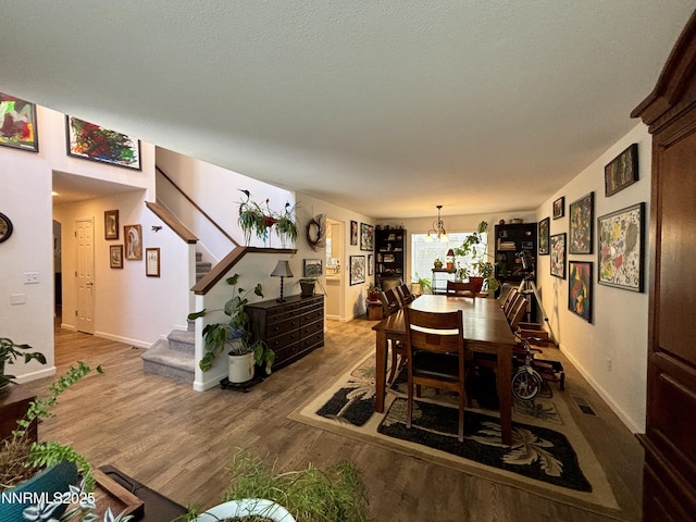 1175 La Cresta Ct, Sparks, NV 89436 - dining area with stairway, wood finished floors, and a chandelier
