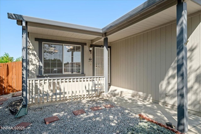 7202 Leonardo Ct, Sun Valley, NV 89433 - entrance to property featuring a porch