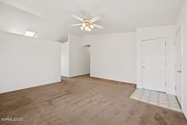 7202 Leonardo Ct, Sun Valley, NV 89433 - carpeted spare room with a ceiling fan and lofted ceiling