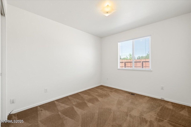 7202 Leonardo Ct, Sun Valley, NV 89433 - carpeted empty room featuring baseboards
