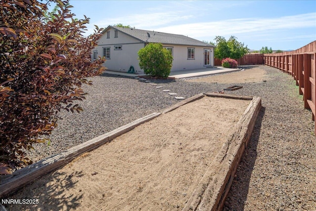 7202 Leonardo Ct, Sun Valley, NV 89433 - fenced backyard with a patio