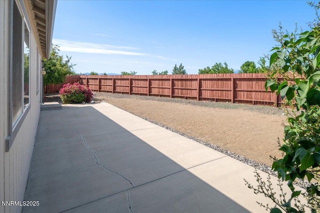 7202 Leonardo Ct, Sun Valley, NV 89433 - fenced backyard with a patio