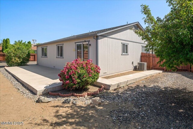 7202 Leonardo Ct, Sun Valley, NV 89433 - back of house featuring a fenced backyard and a patio