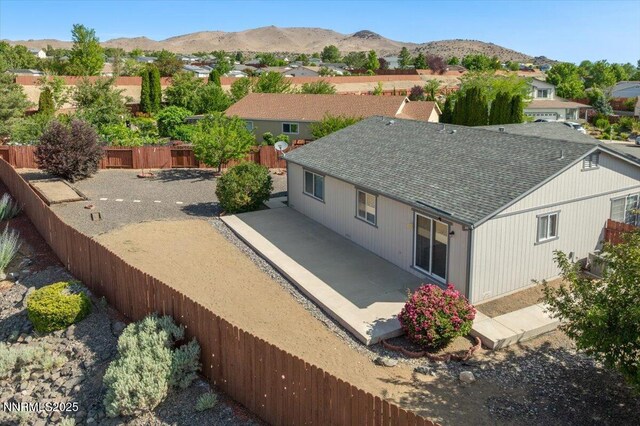 7202 Leonardo Ct, Sun Valley, NV 89433 - aerial perspective of suburban area with a mountainous background