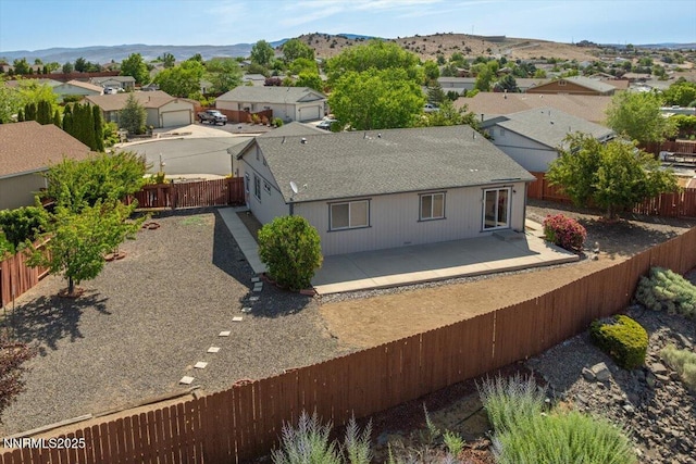 7202 Leonardo Ct, Sun Valley, NV 89433 - aerial view of residential area featuring a mountainous background