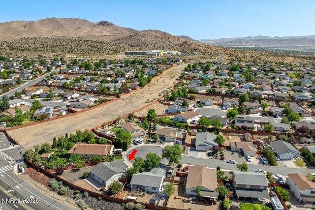 7202 Leonardo Ct, Sun Valley, NV 89433 - aerial view of property and surrounding area featuring mountains and nearby suburban area