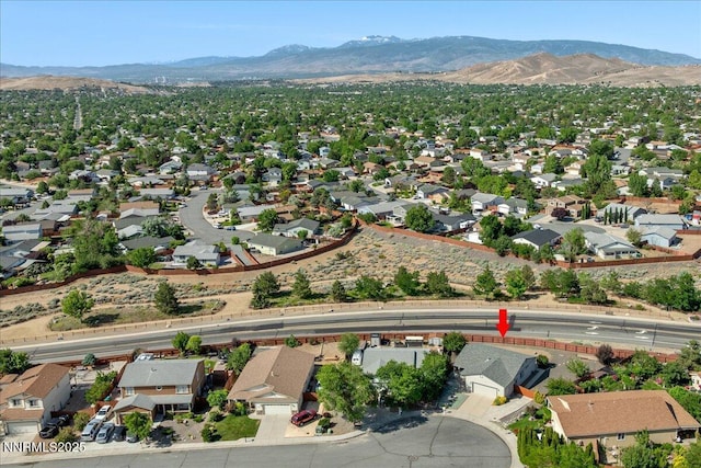 7202 Leonardo Ct, Sun Valley, NV 89433 - aerial view of residential area featuring a mountain backdrop