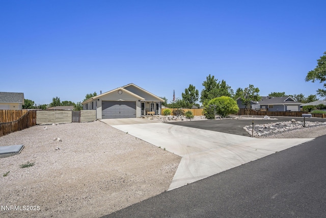 610 Hunter Park Way, Fallon, NV 89406 - view of front of property featuring driveway, a garage, and a gate