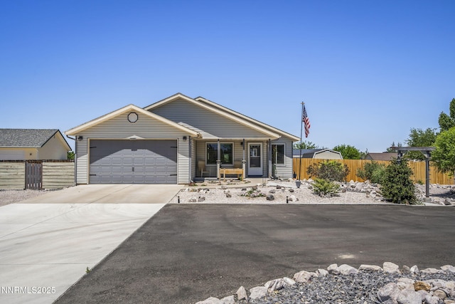 610 Hunter Park Way, Fallon, NV 89406 - ranch-style house with an attached garage, concrete driveway, and a porch