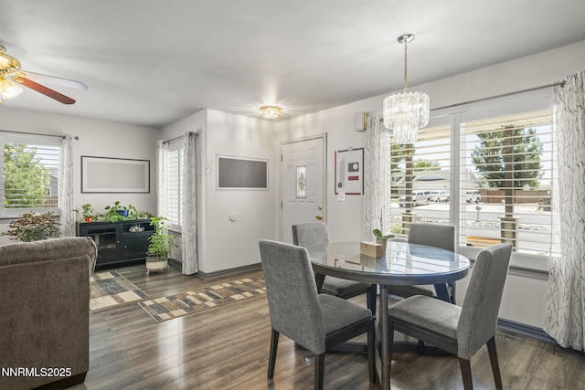 610 Hunter Park Way, Fallon, NV 89406 - dining room with a ceiling fan, a chandelier, and dark wood-style floors