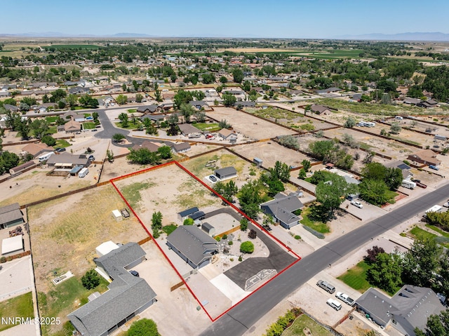 610 Hunter Park Way, Fallon, NV 89406 - aerial perspective of suburban area featuring property parcel outlined and mountains