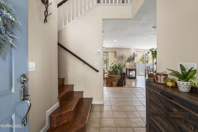 3744 Ranch Crest Dr, Reno, NV 89509 - foyer entrance with tile patterned floors and stairs