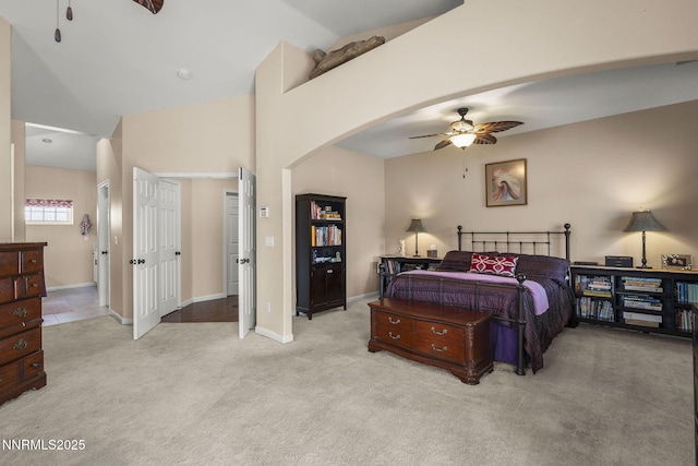 3744 Ranch Crest Dr, Reno, NV 89509 - bedroom featuring light carpet, arched walkways, a ceiling fan, and vaulted ceiling