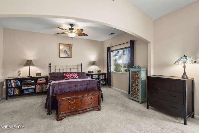 3744 Ranch Crest Dr, Reno, NV 89509 - bedroom with light carpet, arched walkways, and ceiling fan