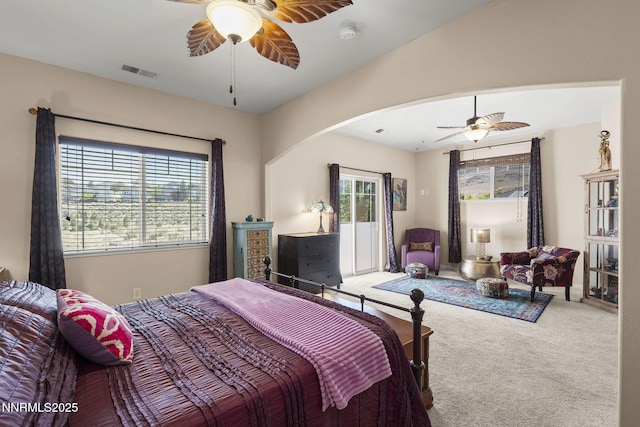 3744 Ranch Crest Dr, Reno, NV 89509 - carpeted bedroom featuring access to exterior, arched walkways, and ceiling fan