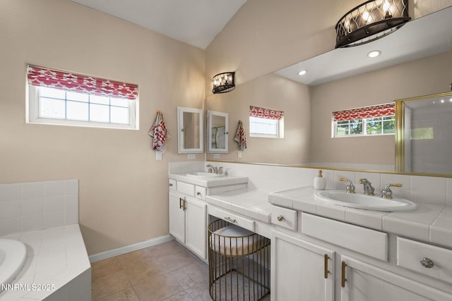 3744 Ranch Crest Dr, Reno, NV 89509 - bathroom with healthy amount of natural light, double vanity, a bath, a shower stall, and recessed lighting