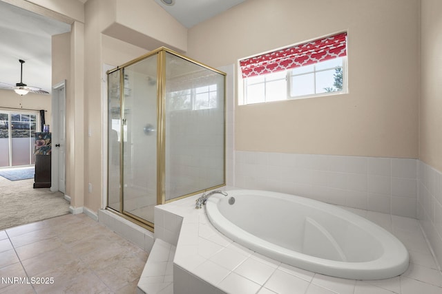 3744 Ranch Crest Dr, Reno, NV 89509 - bathroom with a garden tub, a shower stall, a ceiling fan, and tile patterned flooring