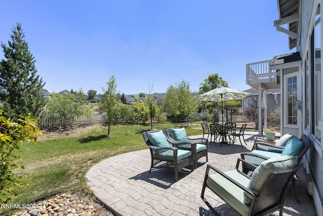 3744 Ranch Crest Dr, Reno, NV 89509 - fenced backyard with a patio area, outdoor dining space, and outdoor lounge area