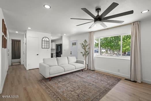 1203 Stanford Way, Sparks, NV 89431 - living area featuring a ceiling fan, wood finished floors, and recessed lighting